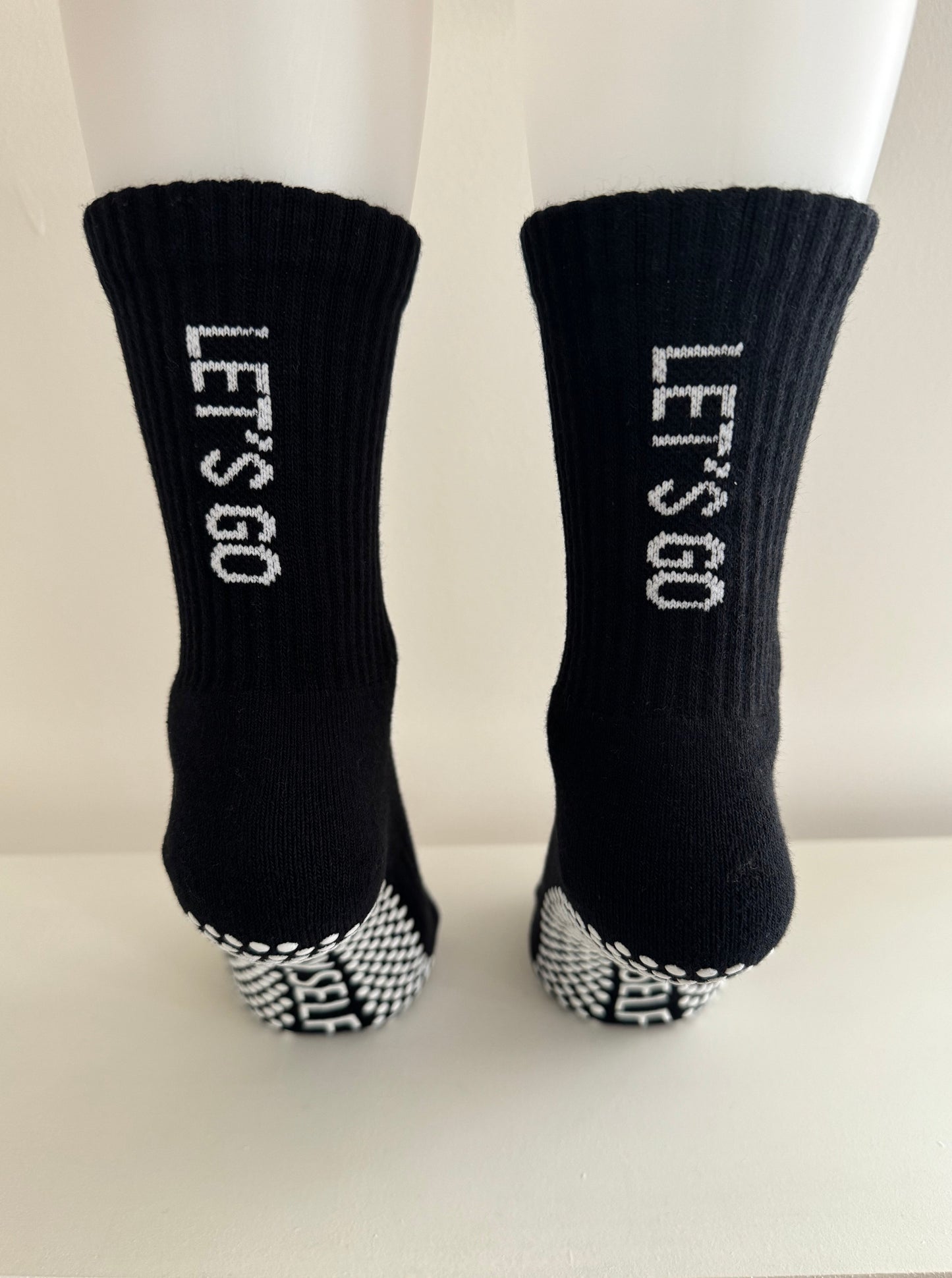 Anti slip grip socks with Let's Go text Black and white